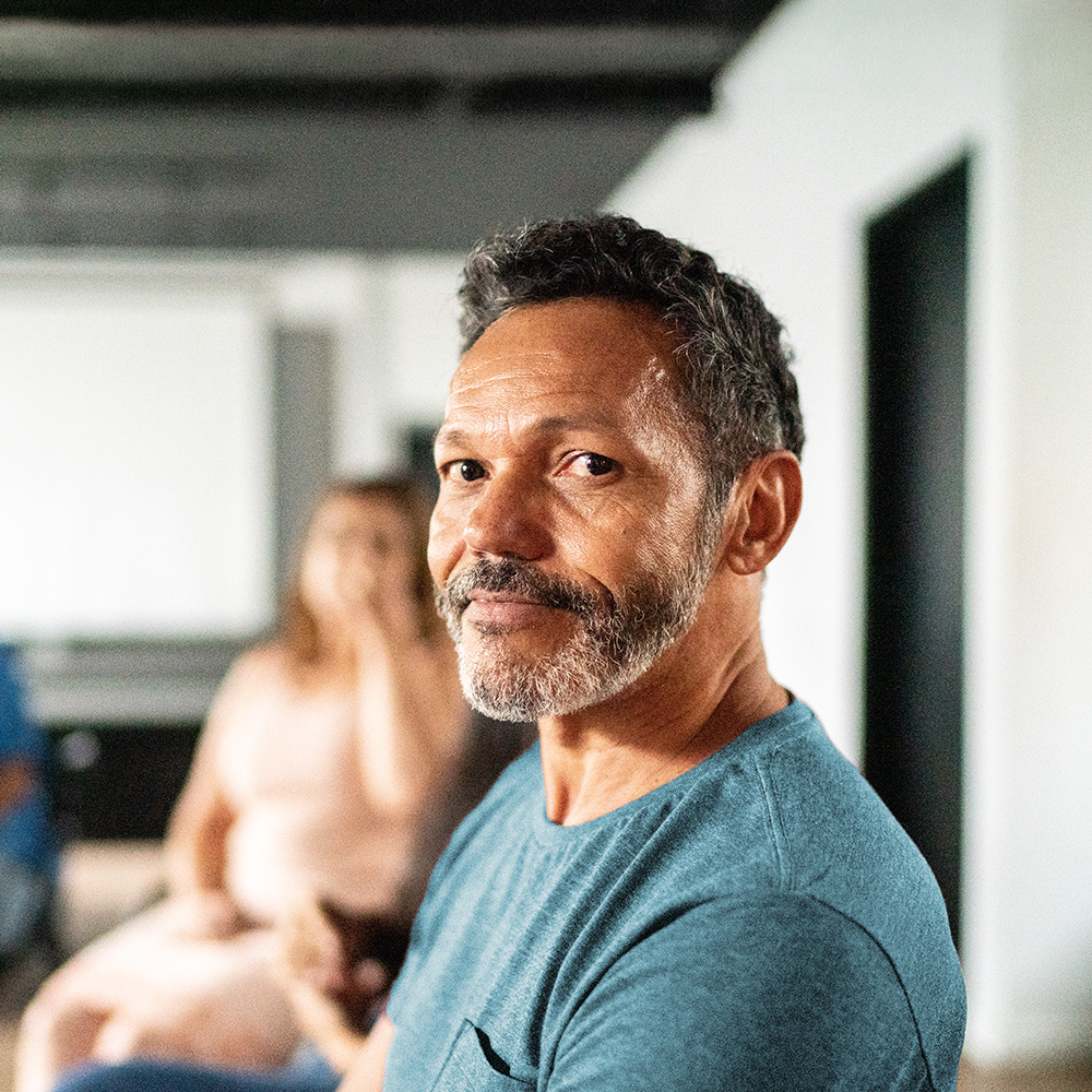 A Fair Approach to Return-to-Work Obligations Man looking at camera